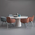 Modern Round Dining Table Set With Gray And Orange Chairs And Tabletop Decor 3d model