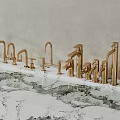 Elegant Golden Faucets Display on White Marble Countertop with Modern Designs