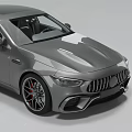 Gray Luxury Sports Sedan With Sleek Profile Large Alloy Wheels And Rear Spoiler