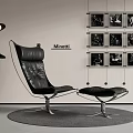 Black Leather Minotti Lounge Chair with Ottoman Floor Lamps and Modern Black White Photo Wall