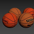 Four Wilson and Spalding Basketball Sports Equipment on Brick and Gray Ground Surface