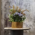 Wooden Brown Vase with Purple Blooms and Green Leaves on Marble Tabletop Near Window