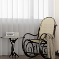 Stylish Leisure Chair Featuring Rattan Seat Metal Frame And Side Table With Books