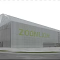 Modern Industrial Factory Building Featuring Glass Curtain Wall Metal Structure And People Under Blue Sky