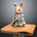 Cute Rabbit Doll Wearing Floral Green Dress Standing On Wooden Platform