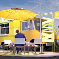 Yellow Food Truck With Outdoor Seating Umbrella Flamingo Decorations And 2023 Signage