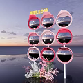 Yellow Hello Lettering With Circular Pink Framed Mirrors Flowers And Sunset Reflection
