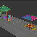 Colorful Playground Equipment With Green Roof Blue Red Pillars And Yellow Rotating Seats