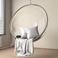 Transparent Acrylic Hanging Chair With White Cushions And Blanket In Living Room