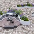 Creative Garden Decor Featuring Circular Wooden Deck Sofa Seating Fire Pit Purple Flowers And Greenery