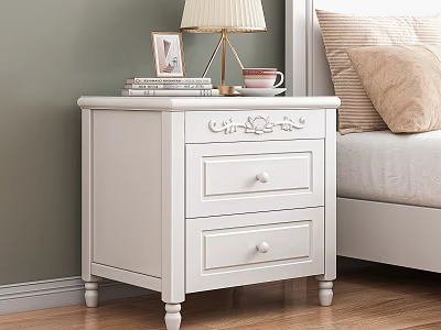 White Bedside Table With Two Drawers Decorative Carvings Table Lamp Books Photo Frame And Mug 3d model