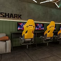 Modern Hotel Guest Room With Yellow Seats And TV Screens In Lounge Area
