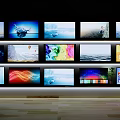 Multiple Modern TVs on Wall with Various Screen Displays and Visual Content 3d model
