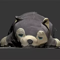 Cute Purple Plush Toy Lying Down With Blue Eyes On Gray Mat