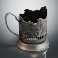 Vintage Silver Metal Cup With Intricate Floral Patterns Openwork Design And Sturdy Base