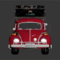 Vibrant Red Volkswagen Beetle With Black Roof Luggage And Travel Gear