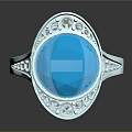 Silver Ring With Large Blue Gemstone And Surrounding Small Diamonds