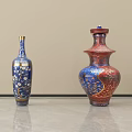 Blue And Red Ceramic Vessels With Intricate Patterns On Tabletop 3d model