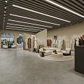 Modern Retail Store Interior With Clothing Racks Sofa Area Fresh Flowers And Ceiling Lights