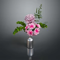 Beautiful Flower Arrangement With Pink Blooms Green Leaves In Silver Vase