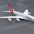 SANTAS White Passenger Plane With Red Tail Design And Four Engines Parked On Reflective Surface