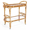 Elegant Wicker Serving Trolley With Glass Shelves And Rolling Wheels Design