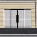 Modern Building Entrance With Reflective Glass Doors White Columns And Stone Pavement
