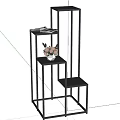 Black Metal Multi Tiered Shelving Unit With Decorative Potted Plant And Tray