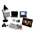 Modern Laptops Display with Lamp Pens Coffee Cup Camera Tablet and Open Notebook 3d model