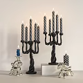 Elegant Black Candle Holders With Striped Candles And Silver Horse Figurines On White Tabletop
