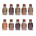 Set Of Glass Spice Bottles With Cork Stoppers Filled With Various Spices