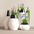 Modern Minimalist White And Black Flower Pots With Purple Blue Flowers Green Plants