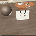 Elegant Wooden Flooring With Silver Metallic Ball And Vince Camuto White Shopping Bag
