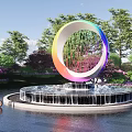 Garden Ornament Rainbow Colored Circular Sculpture with Water Fountain Surrounded by Trees and Flowers