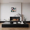 Modern Black Fireplace With Burning Flames And Marble Accent Above Colorful Artwork And Plants
