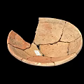 Ancient Broken Ceramic Vessel With Visible Cracked Fragments And Historical Value