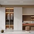 Modern Walk in Closet Interior With White Cabinets Glass Doors Hanging Clothes And Warm Lighting