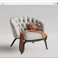 Stylish White Tufted Leisure Chair With Brown Knitted Pillow And Blanket On Black Metal Legs