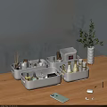 Organized Perfumes And Cosmetics In White Storage Boxes On Wooden Tabletop