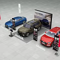 Audi Car Showroom Display With Three Different Colored Vehicles And Signage