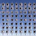 Unique Public Facility With Transparent Blocks Black Butterfly Patterns Neat Arrangement And Blue Sky Background