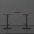 Modern Adjustable Bar Stools With Black And Red Seats And Sturdy Metal Bases