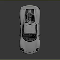 Silver Sleek Sports Car With Green Alloy Wheels On Reflective Surface