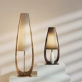 Modern Two Table Lamps With Gold And Dark Frames Light Shades And Minimalist Design