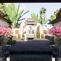 Beachfront Guesthouse Building With Wooden Deck Deck Chairs Large Windows Palm Trees And Ocean View