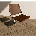 Stylish Brown Leather Leisure Chair With Silver Metal Legs On Wooden Floor