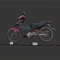 Red And Black Motorcycle Displayed On Platform With Small Tags