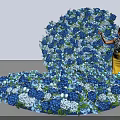 Woman Standing By Latrobe Blue Structure With Blue And White Flowers