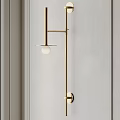 Modern Minimalist Wall Lamp Featuring Golden Metal Frame And Globe Light Shade
