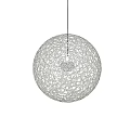 Modern Spherical Pendant Light With Hollow Perforated Design Hanging In Interior Space